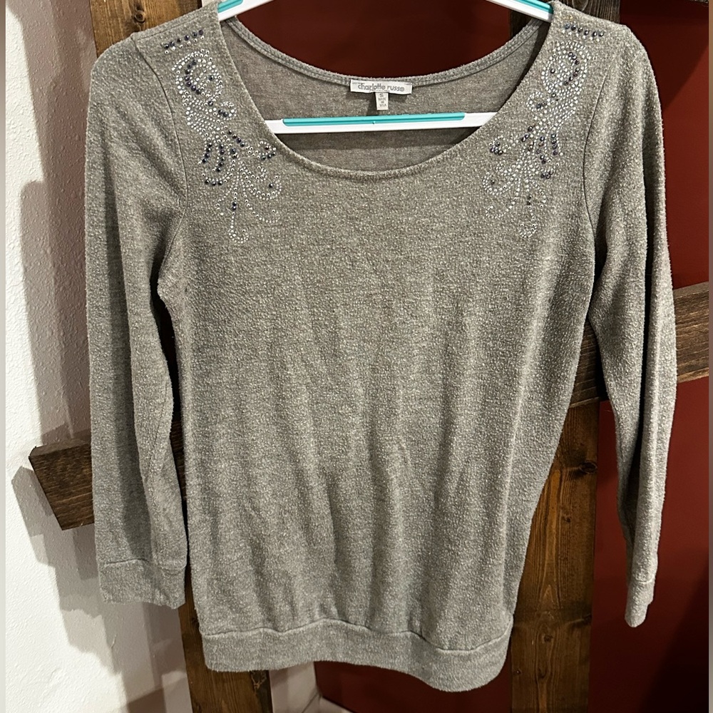 Gray sweater with beaded design near shoulders. Size small